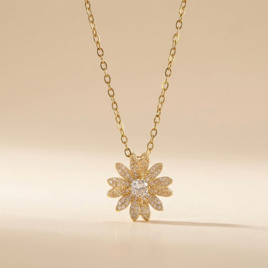 Collar de flor con circonita dorado en acero y oro 18k