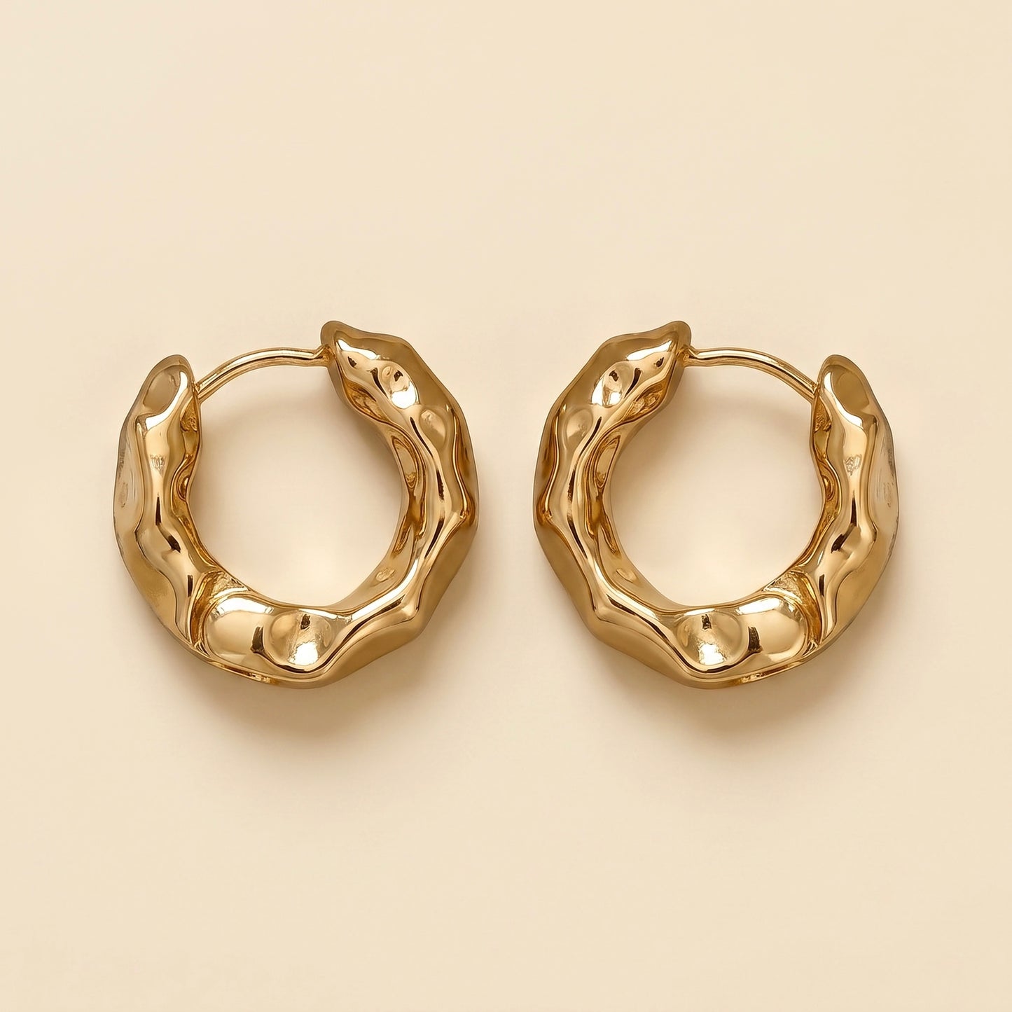 Pendientes ondulados dorados en acero inoxidable y oro 18k