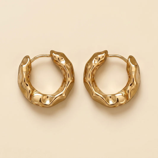 Boucles d'oreilles ondulées dorées en acier inoxydable et or 18 carats