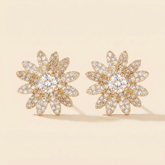 Pendientes de margarita con circonita en acero y oro 18k