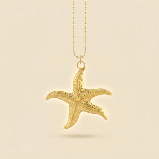 Collar de estrella de mar dorado en acero y oro 18k