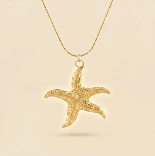 Collar de estrella de mar dorado en acero y oro 18k