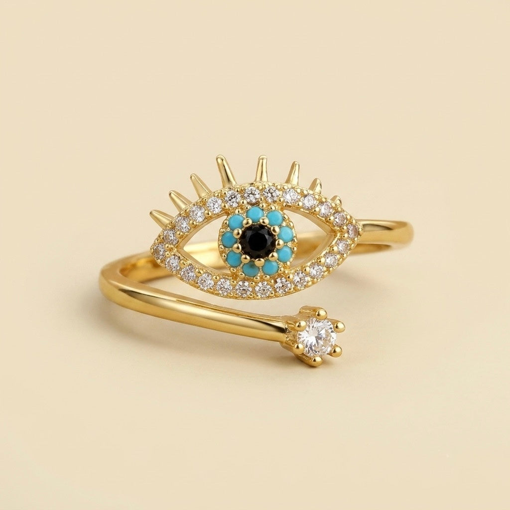 Anillo de ojo turco dorado en acero y oro 18k