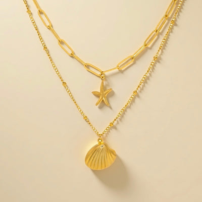 Collier double en coquillage et conque en acier et or 18 carats