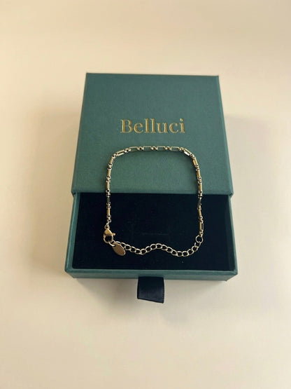 Pulseira de elos dourada em aço e ouro 18k