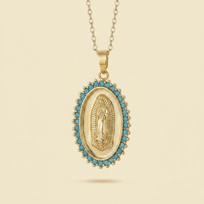 Collier Vierge à l'Enfant en or 18 carats avec zircons bleus