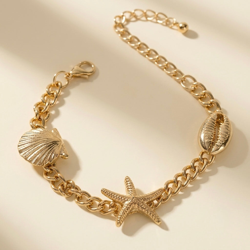 Pulseira tripla de concha, búzios e estrela-do-mar dourada