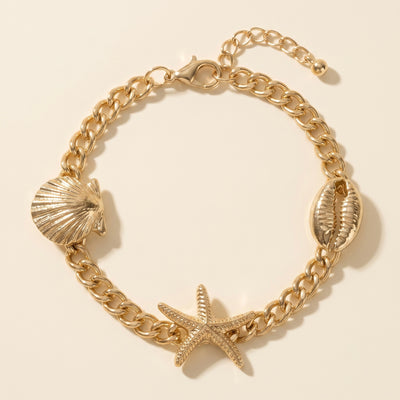 Bracelet triple coquillage, conque et étoile de mer dorée