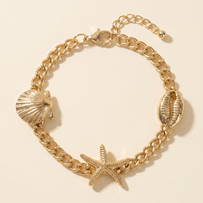 Pulsera triple de concha, caracola y estrella de mar dorada