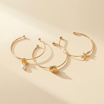 Lot de 3 bracelets de plage : coquillage, conque et étoile de mer