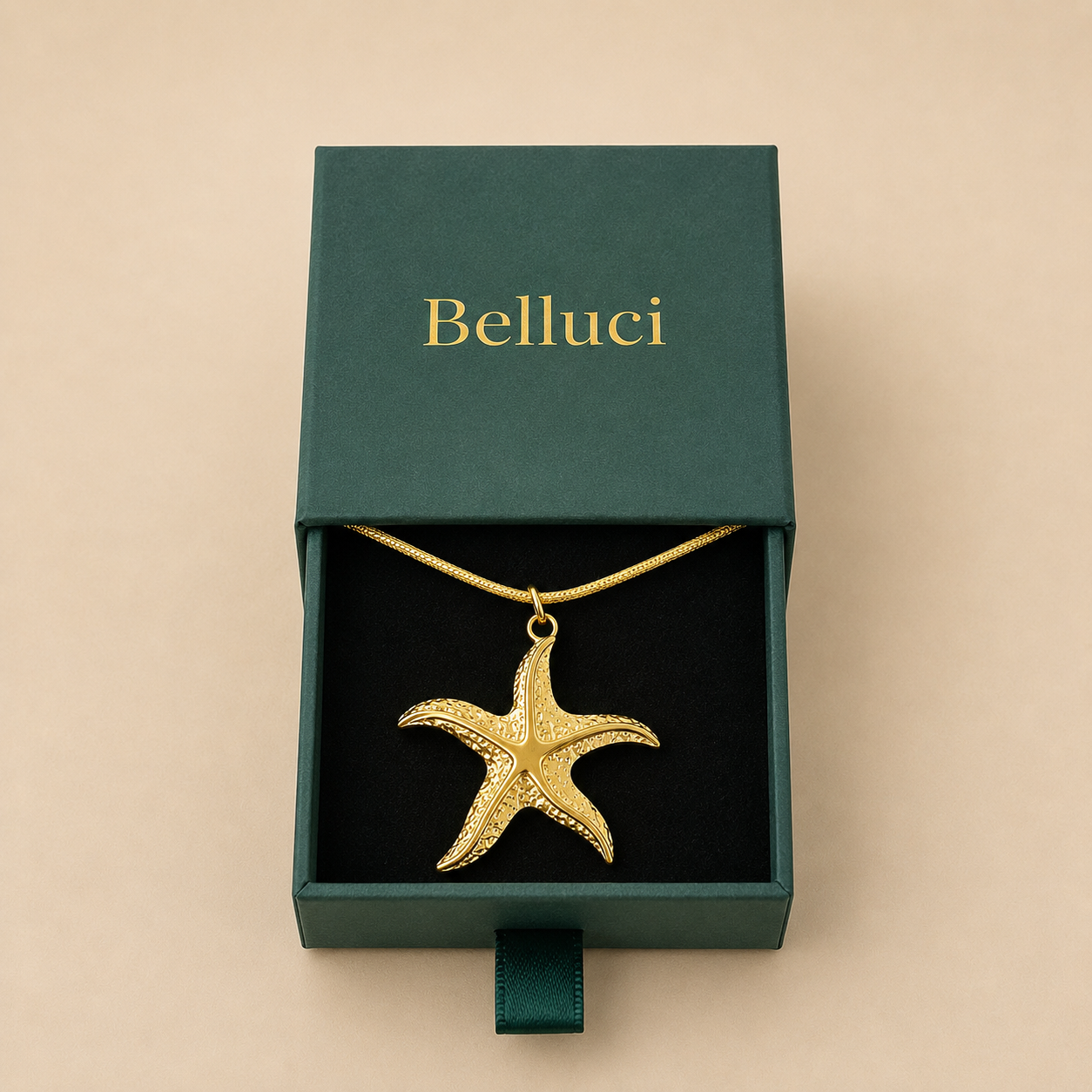 Collar de estrella de mar dorado en acero y oro 18k