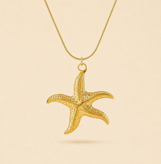 Collar de estrella de mar dorado en acero y oro 18k
